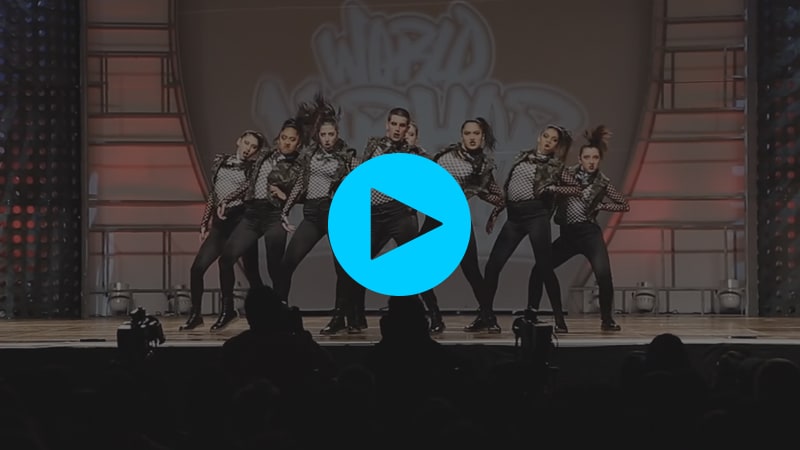 A screenshot from a Youtube video of Sorority dance crew performing at the 2013 Hip Hop International competition.