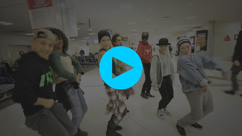 A still from a Youtube video where Justin Bieber’s dancers are improv dancing in an airport.
