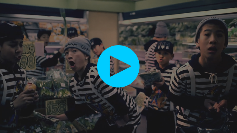 A bunch of swaggy kids looking surprised in the supermarket